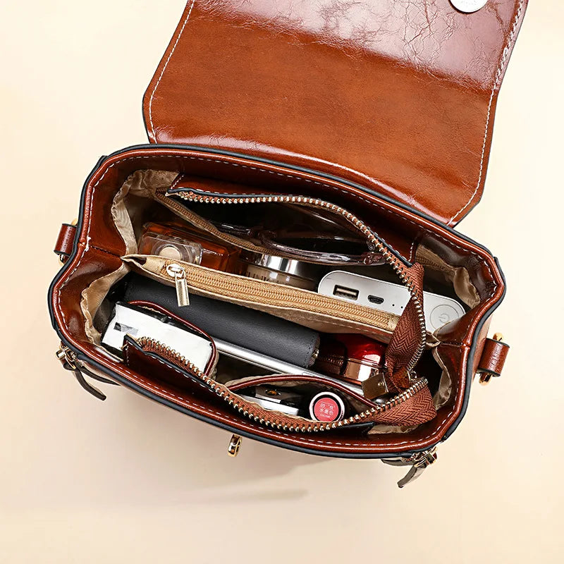 Bolsa feminina em couro genuíno transversal